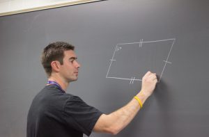 Mr. Melone teaches his students about angles and parallelograms.