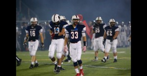 They say defense wins games, for the Cougars this holds true as Tim Cullen leads off players after a successful turnover.