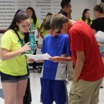 Annie Rosas helps incoming freshmen find their classrooms.