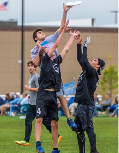 Michael Kennelly defends the throw. 