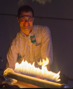 Mr. Torpe happily demonstrates waves using fire.